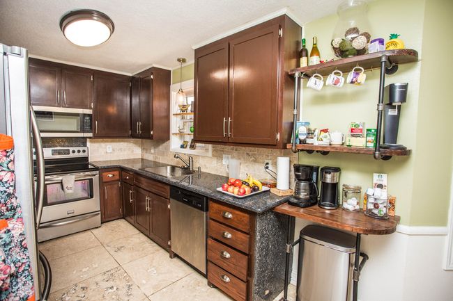Beautiful kitchen with window above the sink | Image 15