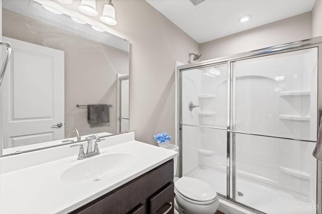 Primary suite bath adjoins to bedroom | Image 24