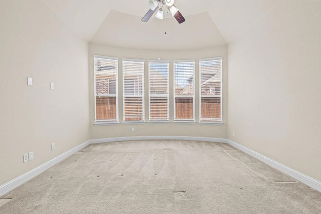 Unfurnished room featuring light carpet and baseboards | Image 16