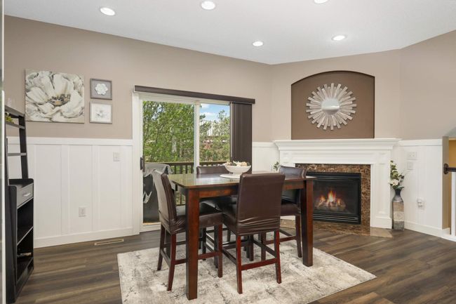 Eat in kitchen area with patio door to back deck | Image 8