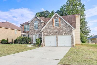 6386 Celtic Drive Sw, House other with 4 bedrooms, 2 bathrooms and 2 parking in Fulton GA | Image 2