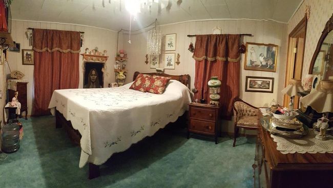 Bedroom featuring carpet flooring and lofted ceiling | Image 31
