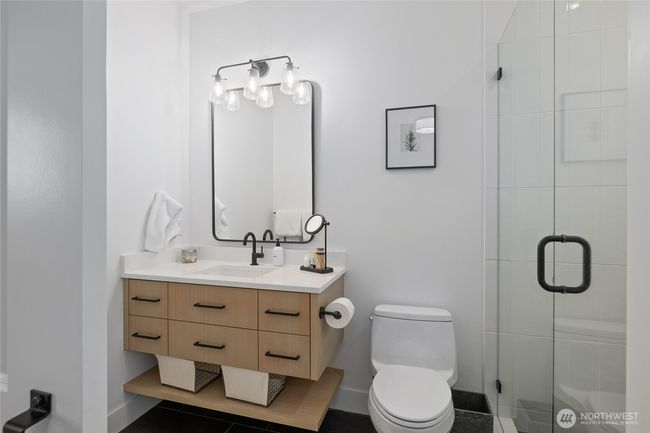 2nd bedroom bathroom with shower. | Image 19