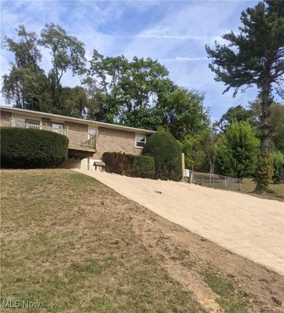 Front of home from road. Currently seeded for new grass due to brand new septic just installed and completed August 2024 | Image 1