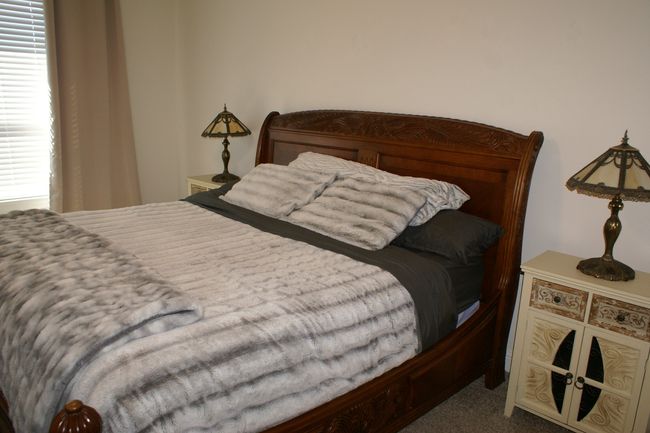 Spacious Bedroom with carpet flooring | Image 25