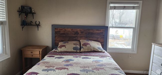 Bedroom with baseboards | Image 10