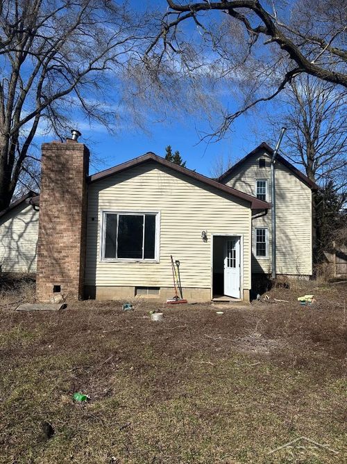 609 Olive St, Saint Louis, MI, 48880-1664 | Card Image