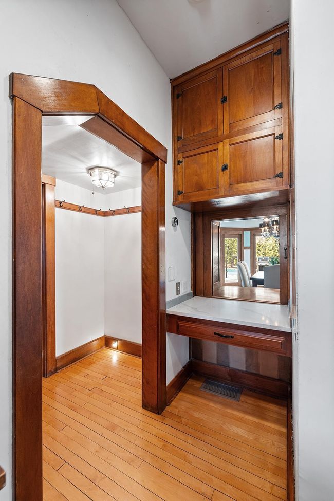 Closet and unique desk and pass-through into the dining room. | Image 29