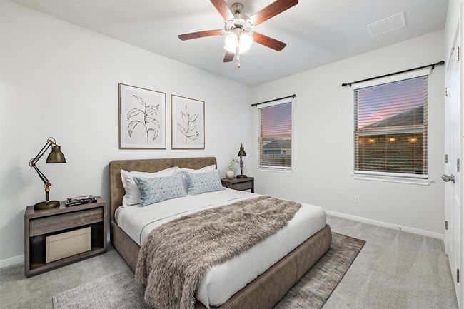 Bedroom featuring visible vents, baseboards, ceiling fan, and carpet flooring | Image 13