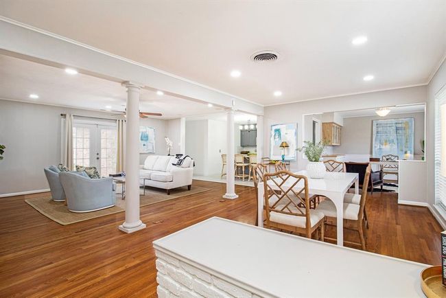Original solid wood floors run throughout the majority of the home. | Image 4