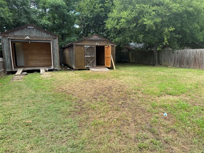 Two Storage buildings on side lot. | Image 4