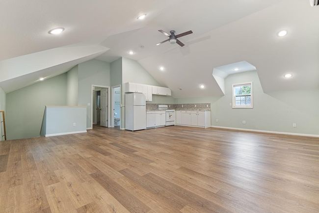 This spacious loft offers potential for not just additional living space, but could be a potential rental opportunity! | Image 30