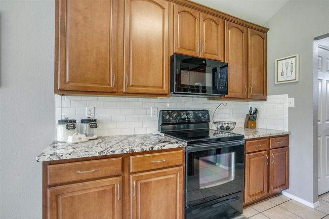 Kitchen with ample cabinet space | Image 23