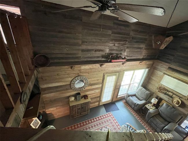 View of Living Room form Top of Stairs | Image 27