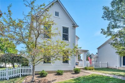 View of front facade with a front lawn | Image 3