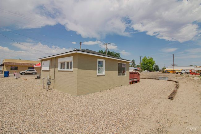 View of home's exterior featuring brick siding | Image 27
