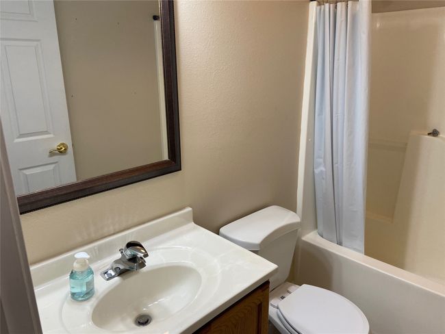Full bathroom with vanity and shower / bath combo | Image 37