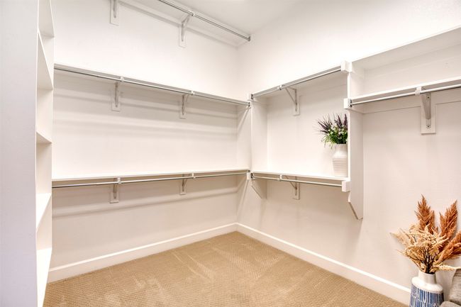 Primary closet with custom shelving. | Image 20