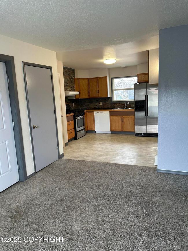 Kitchen from living room | Image 13