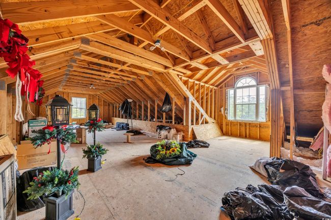 View of unfinished attic | Image 15