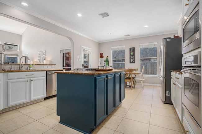 An abundance of cabinets and counter space | Image 16