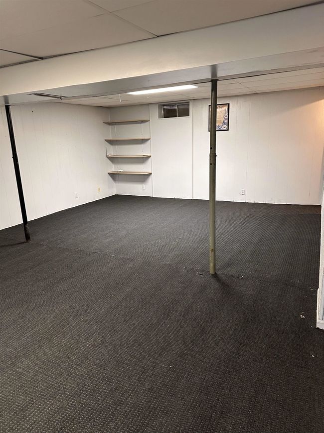 Finished below grade area with carpet floors | Image 11