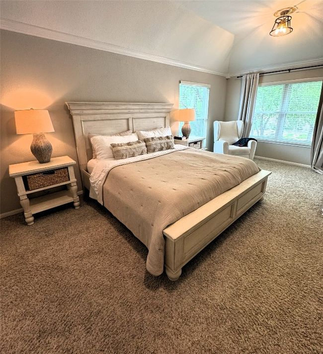 Primary Bedroom with crown molding and vaulted ceiling | Image 31