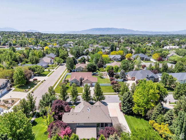 Aerial perspective of suburban area with a mountainous background | Image 36