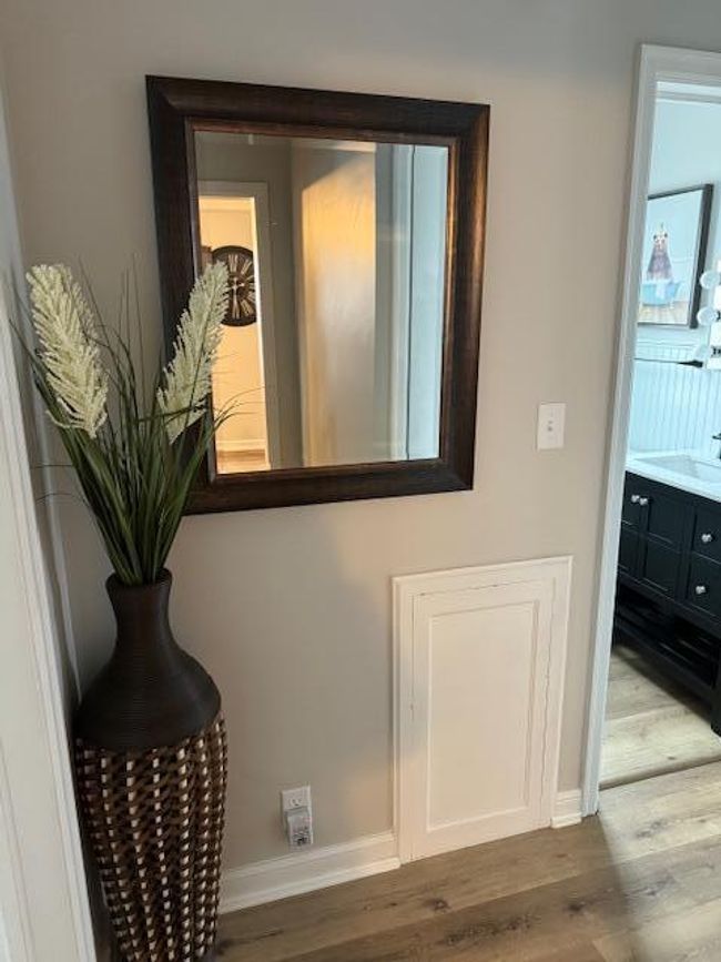 Hallway to Main Level Bedrooms & Remodeled Bathroom | Image 8