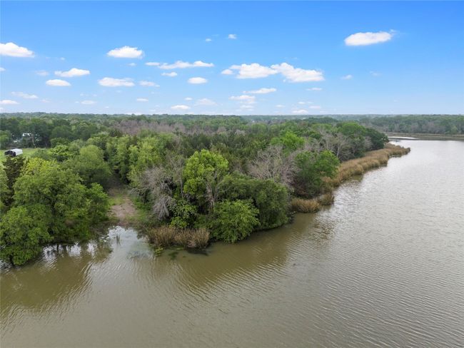 Bird's eye view featuring a water view and a forest view | Image 12