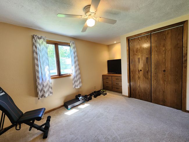 Bedroom #2 on the main currently serves as workout room. | Image 12