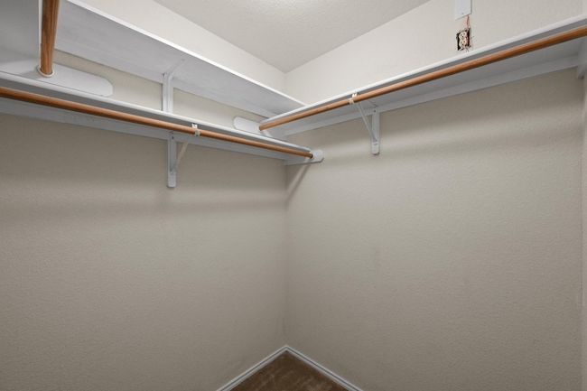 View of spacious closet | Image 20
