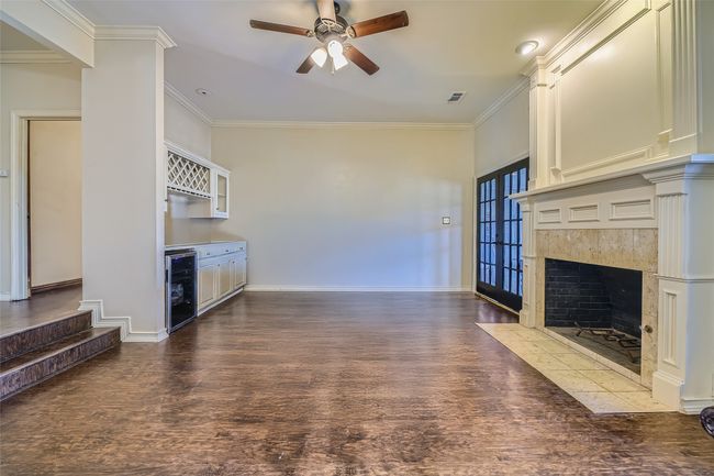 Play games, dine, or watch the big game in your very own hospitality suite with fireplace, dry bar and wine cooler. | Image 24