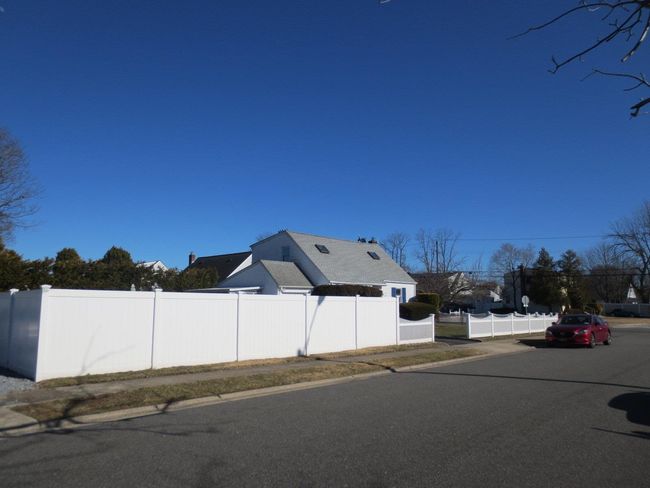 View of road featuring curbs and sidewalks | Image 9
