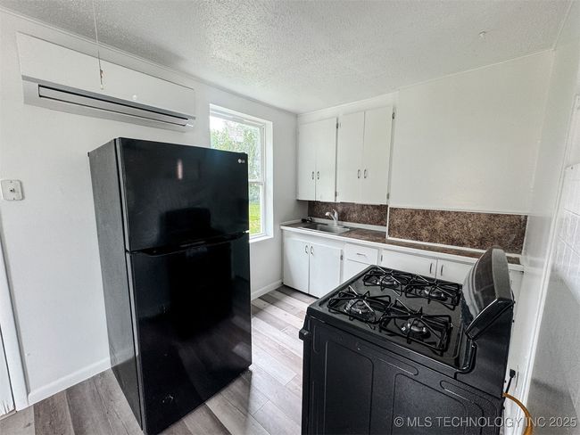 916 Coy Ave, Home with 3 bedrooms, 2 bathrooms and null parking in Tahlequah OK | Image 30