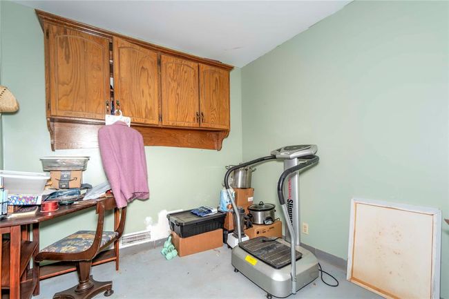 Storage room in garage with air temp control | Image 27