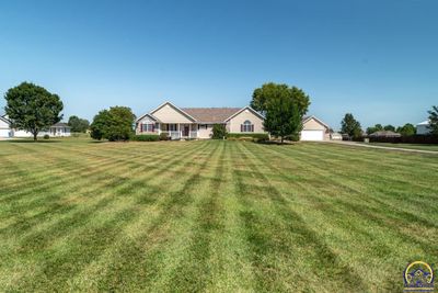 450 Nw 50th St, House other with 5 bedrooms, 3 bathrooms and null parking in Topeka KS | Image 1