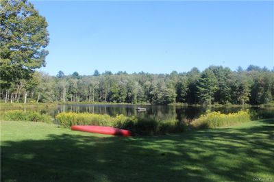 View of yard featuring a water view | Image 3