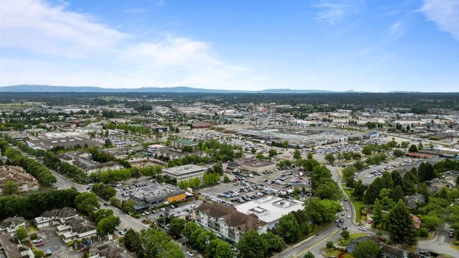 Aerial view of property's location featuring a mountainous background | Image 8