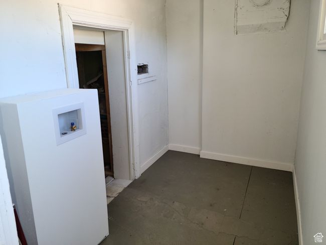 Laundry room with hookup for a washing machine and baseboards | Image 35