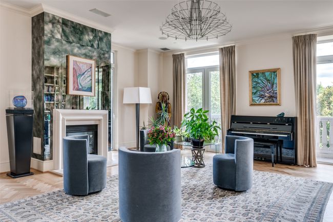 Living room with gas fireplace. Opens to terrace. | Image 5