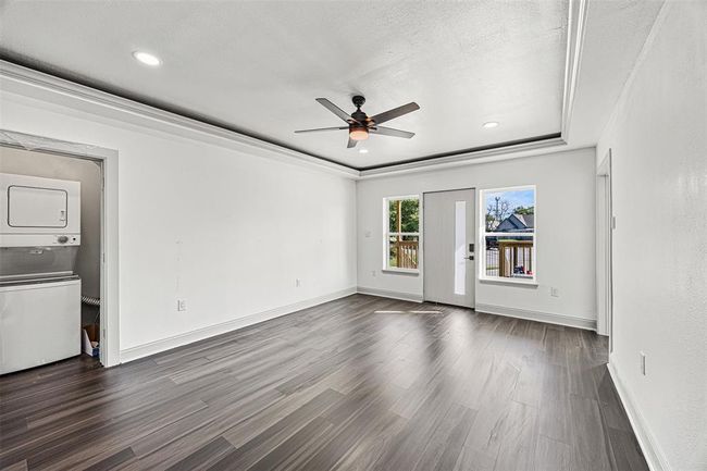 Downstairs living room with w/d | Image 6