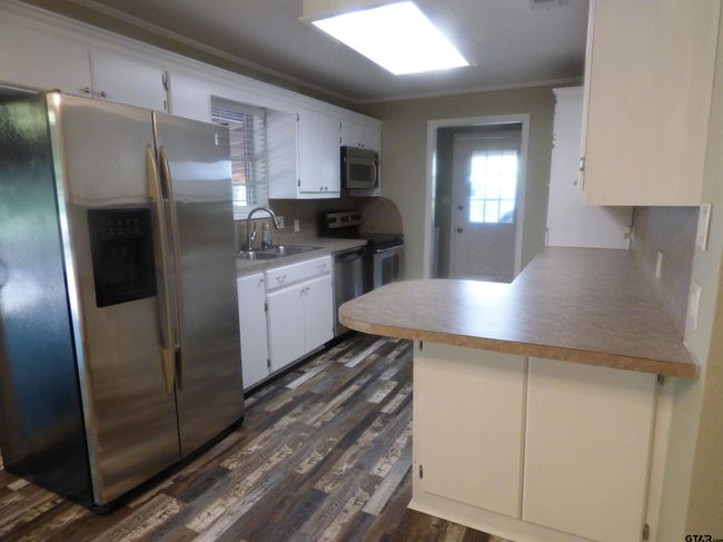 596 County Road 4218, House other with 3 bedrooms, 2 bathrooms and null parking in Mount Pleasant TX | Image 15