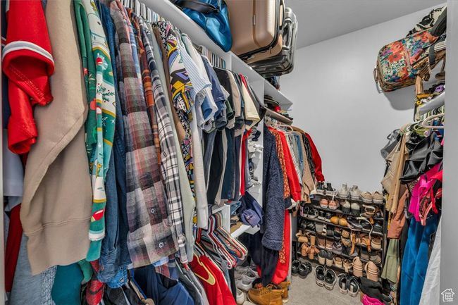 Spacious closet featuring carpet | Image 18