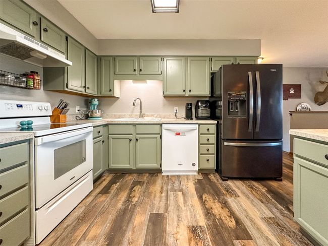 Open concept kitchen/living/dining | Image 25