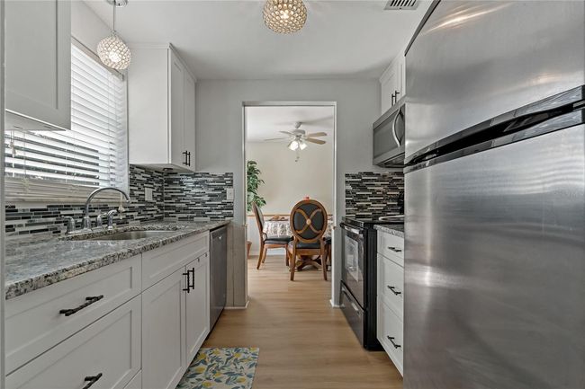1403 Coppertree Dr, House other with 3 bedrooms, 1 bathrooms and null parking in TARPON SPRINGS FL | Image 4