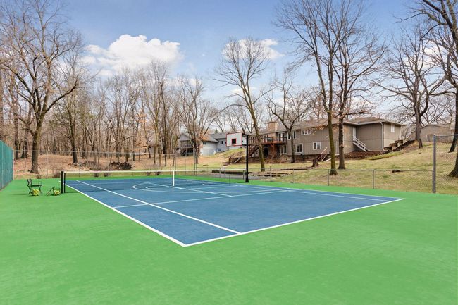 Tennis/sport court potential backyard seen here with virtual. staging | Image 4