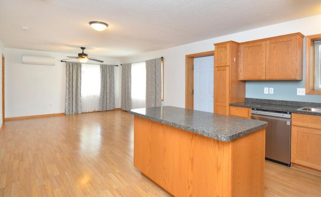 View from Kitchen into Living Room and Dining Room.jpg | Image 10