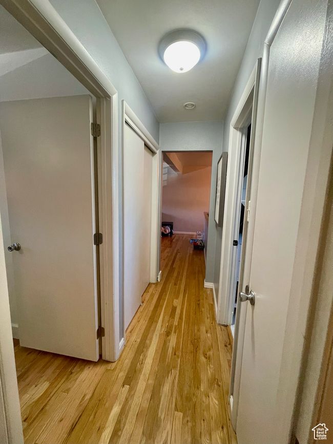 Hallway featuring light wood-style flooring | Image 15