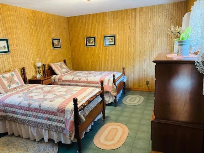 Bedroom with wooden walls | Image 16